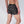 Load image into Gallery viewer, rear view on mae model of men's boxer brief of skulls and crossbones