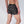 rear view on mae model of men's boxer brief of skulls and crossbones