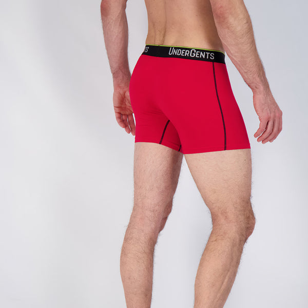 see the red boxer brief from behind.