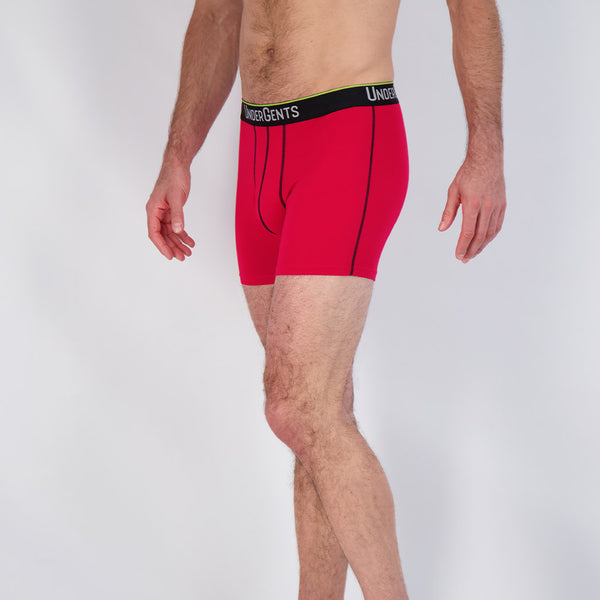 4.5 inch red men's boxer brief by undergents side view skims the leg without any squeezing. feel the difference in comfort