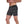 Load image into Gallery viewer, undergents boxer short side view of skulls and bones with leg movement. comfort and never compression of binding. all way movement, no squeeze, freedom

